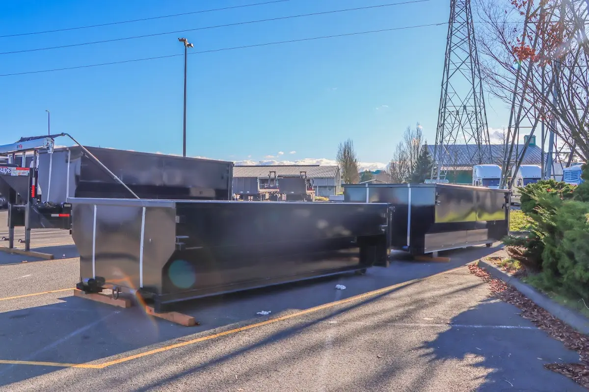 Roll-off dumpster ready for waste disposal at job site for 6 Yard Dumpster Rental in Indianola